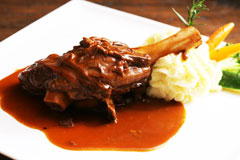 LAMB SHANK SLOW COOKED IN RED WINE SAUCE